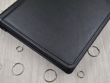 Carica l'immagine nel visualizzatore di Gallery, aerial view of a total black photo book by Giovelli Design