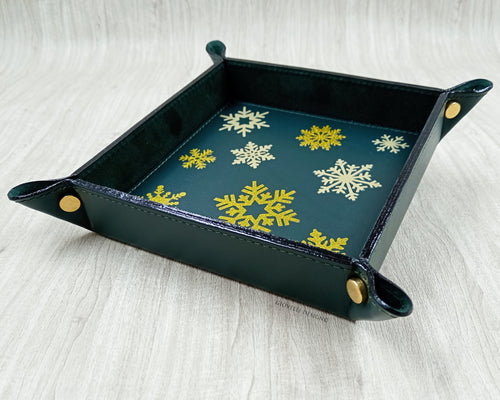 handcrafted italian green leather pocket emptier with a winter and christmas theme by Giovelli Design