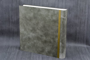 gray back with gold line of a leather photo album by Giovelli Design