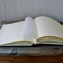 Carica l'immagine nel visualizzatore di Gallery, open brown italian leather wedding album with white sheets and protective tissue