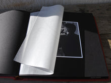 Carica l'immagine nel visualizzatore di Gallery, opened album with black pages and protective tissue