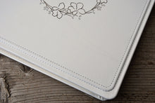 Load image into Gallery viewer, stylish finishes and seams on a white leather album by Giovelli Design
