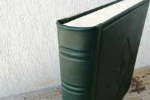 Load image into Gallery viewer, spine of green italian leather album by giovelli design