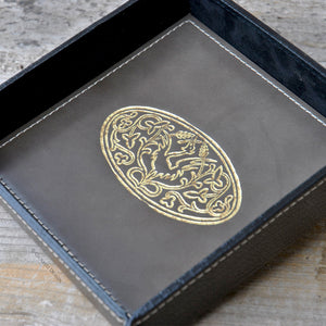 picture from above of a grey leather catchall with an enchanting gold foil embossing by Giovelli Design