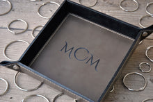 Load image into Gallery viewer, picture from above of the monogram inscription on a leather catchall by Giovelli Design
