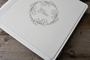 white wedding leather album with a wonderful wreath by Giovelli Design