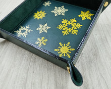 Load image into Gallery viewer, shining gold foiled snowflakes on a leather valet tray by Giovelli Design
