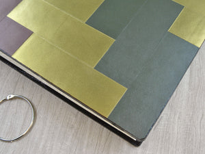 particular of a patchwork on a leather cover by Giovelli Design