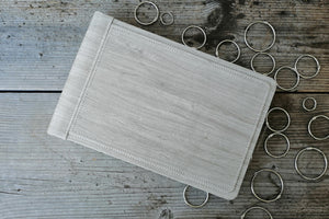 picture from above of a rustic and rectangular faux leather album by Giovelli Design