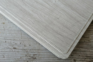 fancy finishes and seams of a beautiful photo album by Giovelli Design