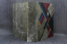 Load image into Gallery viewer, back of a luxury mosaic photo book by Giovelli Design
