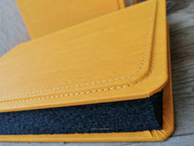 Load image into Gallery viewer, fancy finishes and seams of a stunning yellow giovelli design album with black pages
