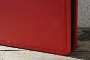 elegant finishes on a red leather photo book by Giovelli Design