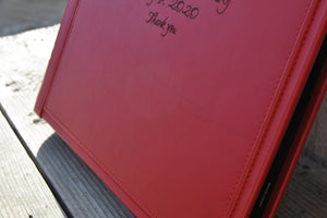 stylish finishes on a red genuine leather photo album by Giovelli Design