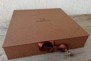 stunning brown box for albums by giovelli design