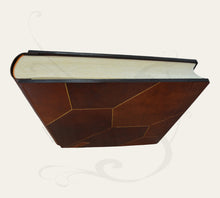 Load image into Gallery viewer, pic from above of a leather patchwork family album by Giovelli Design
