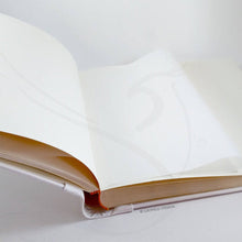 Load image into Gallery viewer, opened photo album with white pages and protective tissue
