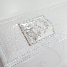 Load image into Gallery viewer, beautiful bi-laminated silver plaque on a photo album
