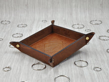 Load image into Gallery viewer, handmade in Italy coin tray with a hot stamped fleur de lis by Giovelli Design
